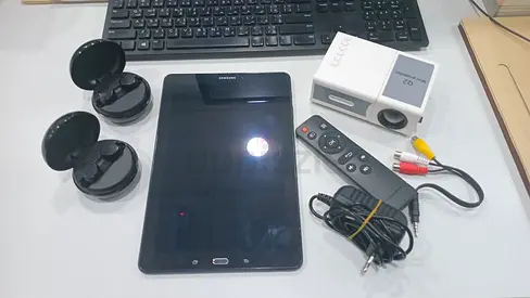 Samsung tablet, mini portable projector and 2 TWS earbuds bundle