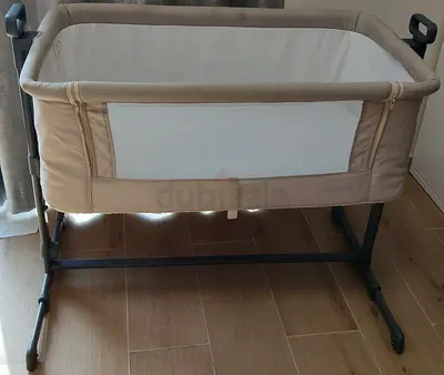 Beige bedside bassinet / co-sleeper - sturdy frame, good condition( used once for naming ceremony)