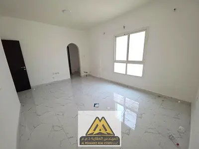 Two rooms and a large living room in Al Rashidiya 1, opposite the fish market, close to all services and main roads.