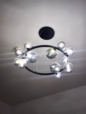 Modern circular chandelier with glass globe bulbs