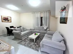 Sharjah Al Taawun, two-bedroom apartment, hall, kitchen, and two bathrooms