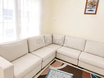 Light beige L-shaped modular sofa - 5 pieces, good condition