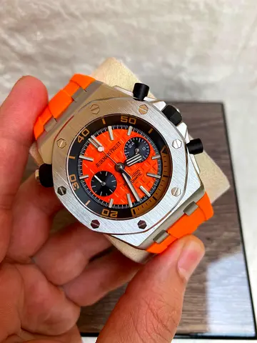 The watch shown in the image is an Audemars Piguet Royal Oak Offshore Diver Chronograph (Ref. 26703S