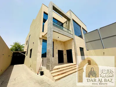 5-bedroom villa for annual rent in Al Jazat, Sharjah, featuring a spacious living room and majlis,