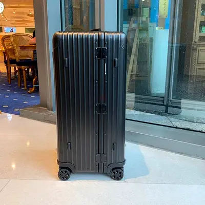 Black aluminium Rimowa trunk suitcase