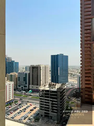 Largest 1BHK in Ajman One Towers for rent, master bedroom, built-in wardrobes, spacious, prime loca