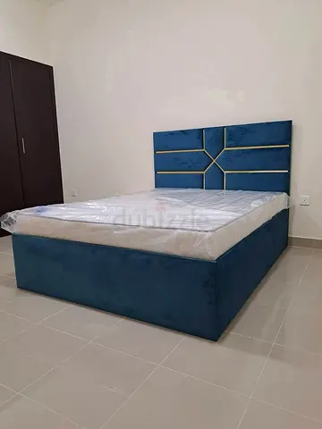 Blue Velvet Double Bed with Storage and Geometric Headboard