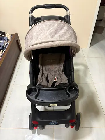 Lightweight baby stroller with canopy and snack tray and not used much and price is negotiable