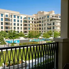 Luxury 1 Bedroom - Balcony with pool view - Laundry Room - Parking