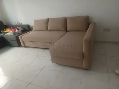 Beige L-shaped Sofa with Storage - Good Condition