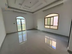Second-tenant villa for annual rent in Al Yasmeen, five master bedrooms, majlis, two living rooms, m