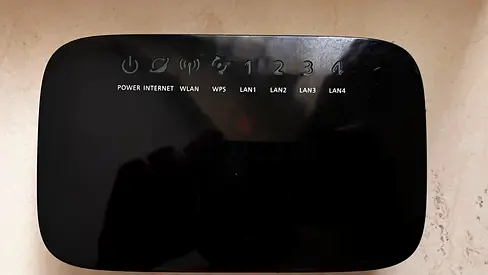 Used WiFi Router with 4 LAN Ports - Good Working Condition