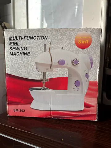 Portable Mini Sewing Machine (8-in-1) - Lightly Used
