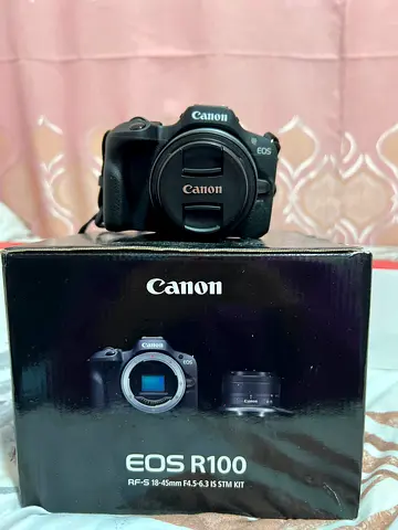 Canon EOS R100 with RF-S 18-45mm Kit - Excellent Condition + Provision professional tripod.
