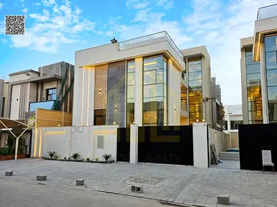 A distinctive villa with a modern facade, private garden, and spacious rooftop terrace in a prime location close to all amenities.