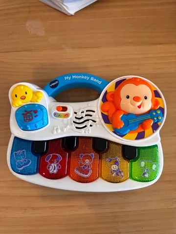 Baby musical toy piano with lights - gently used