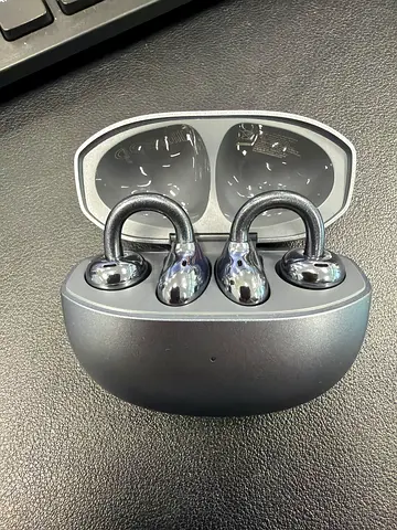 Used true wireless earbuds with charging case - good condition