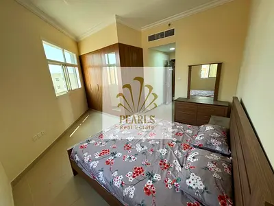 The finest and largest two-bedroom apartment with a living room, first occupancy, in Al Jurf 3, nea