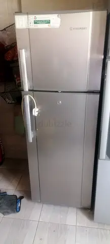 Silver double-door refrigerator - good working condition
