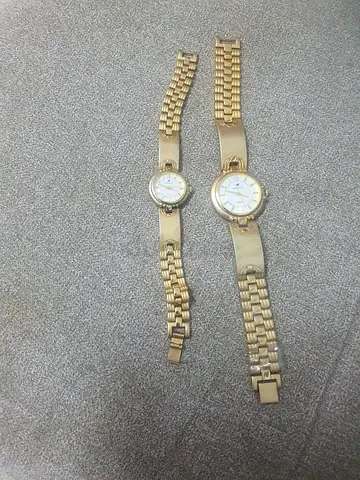 Pair of gold-tone wrist watches (his and hers) - working