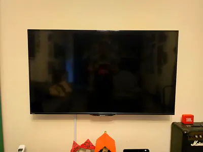 50 inch Wall-Mounted Sharp TV (Good Condition)