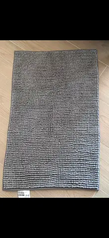 Two textured bathroom/door mats - good condition