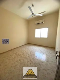 Large studio in Al Rawda 3, main street, separate kitchen, split AC, free maintenance, near Sheikh A