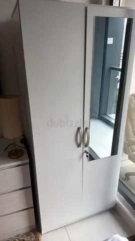 Slim white wardrobe with mirror - good condition