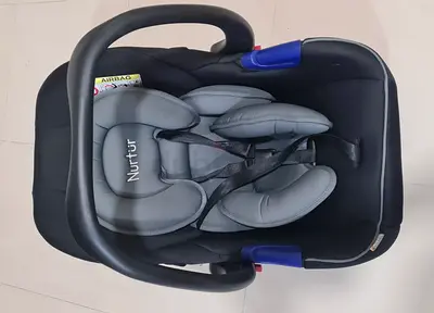 Nurtrur infant car seat / newborn baby carrier - good condition