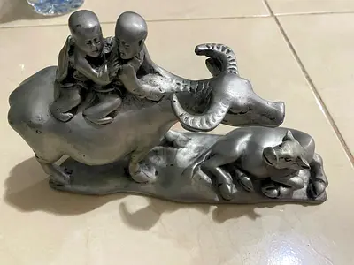 Metallic animal figurine