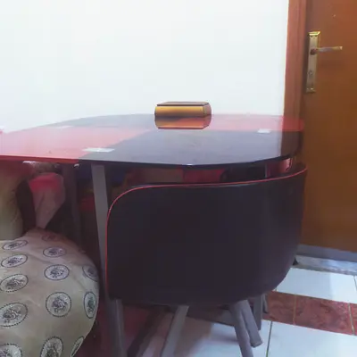 Compact glass Dining Table with 4 Chairs - Good Condition