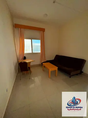 Furnished one-bedroom apartment in Al Butina with central AC and central gas, prime location near services. AED 24,000, payment in 4 installments.