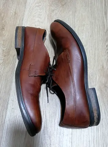 Brown leather men's dress shoes, size 44, gently used