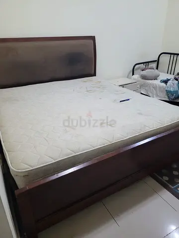 Double wooden bed frame with mattress - used