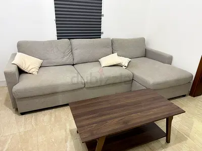 Light grey L-shaped 3-seater sofa with chaise