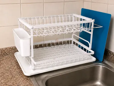 Two-tier white kitchen dish drying rack with cutlery holder and draining tray