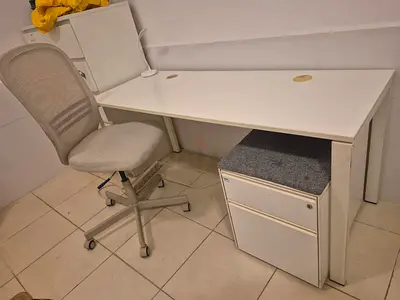 White home office desk, chair and drawer. Prime condition all items. Neat and clean.