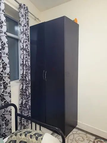 Dark brown 2-door wardrobe / armoire in good condition