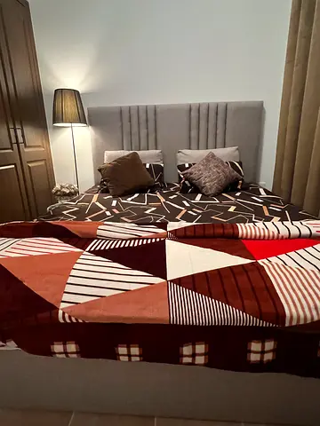 King bed frame with upholstered headboard and mattress/ storage - good condition