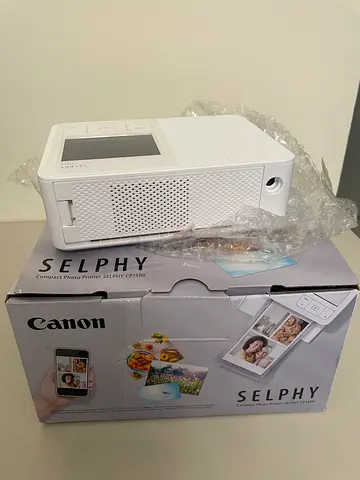 Brand New Canon SELPHY CP1500 Wireless Photo Printer + Extra Paper/Ink Bundle