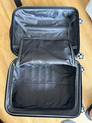 Expandable small black roller suitcase - hard shell carry-on, perfect condition