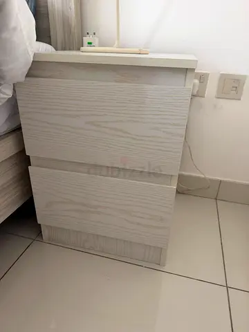 Light wood bedside nightstand with two drawers