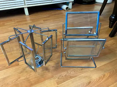 Multi panel table top rotating photo frame