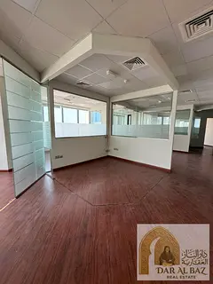 Commercial office in Al Majaz 2 with 3 months free | Well-divided space | Free air conditioning | Se