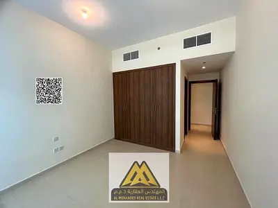 Own a two-bedroom apartment with two parking spaces in Ajman One Towers with a down payment of only
