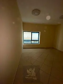For annual rent in Al Majaz 3 Sharjah two bedroom apartment with living room two bathrooms storage r