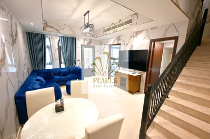 Furnished townhouse for sale in Al Zahya, Ajman, on Sheikh Mohammed Bin Zayed Road, 3BR, living room, 3 bathrooms, balcony, yard and 3-car parking.