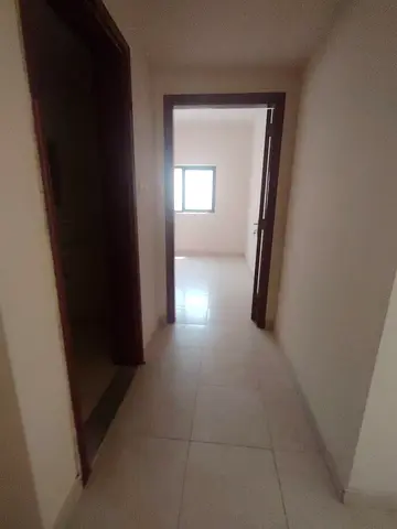 Abu Shaghara Spacious one-bedroom apartment with a living room Price: 28,000 Payable in 4 or 6 cheques