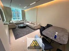 A spacious 1-bedroom apartment with a living room is available for cash sale in Orient Towers, Ajman