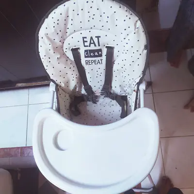 Baby high feeding chair with tray - 'Eat Clean Repeat' cover, good condition